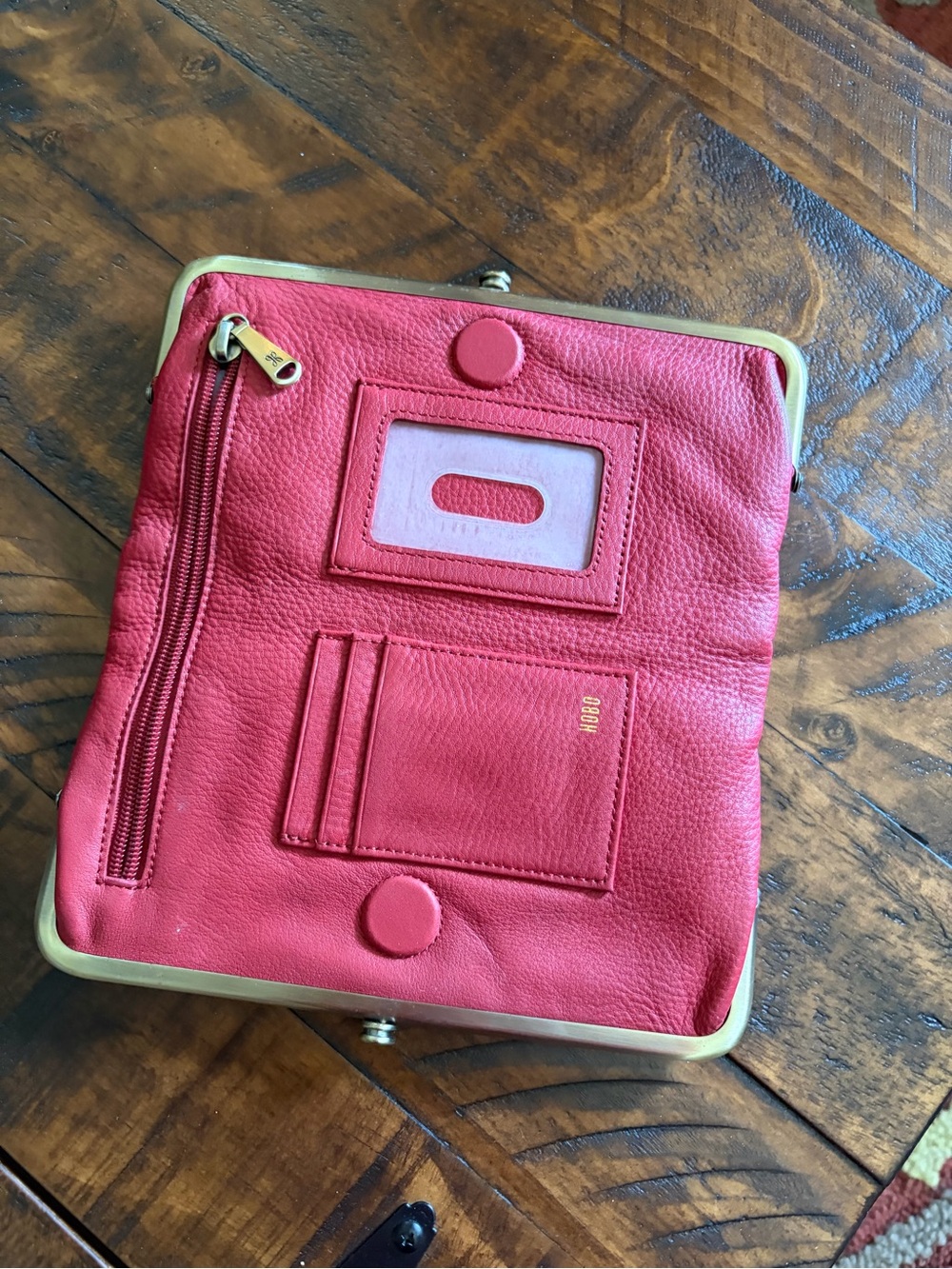 Hobi Laure
N Red Leather Clutch with Gold Trim